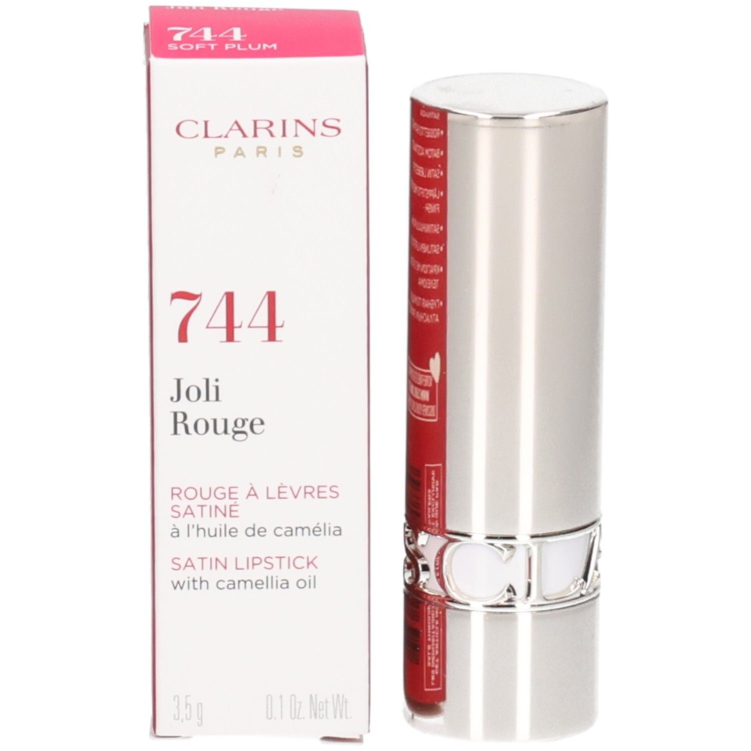 Clarins Joli Rouge Lippenstift 744 Soft Plum in silberner Hülse neben der Verpackung.