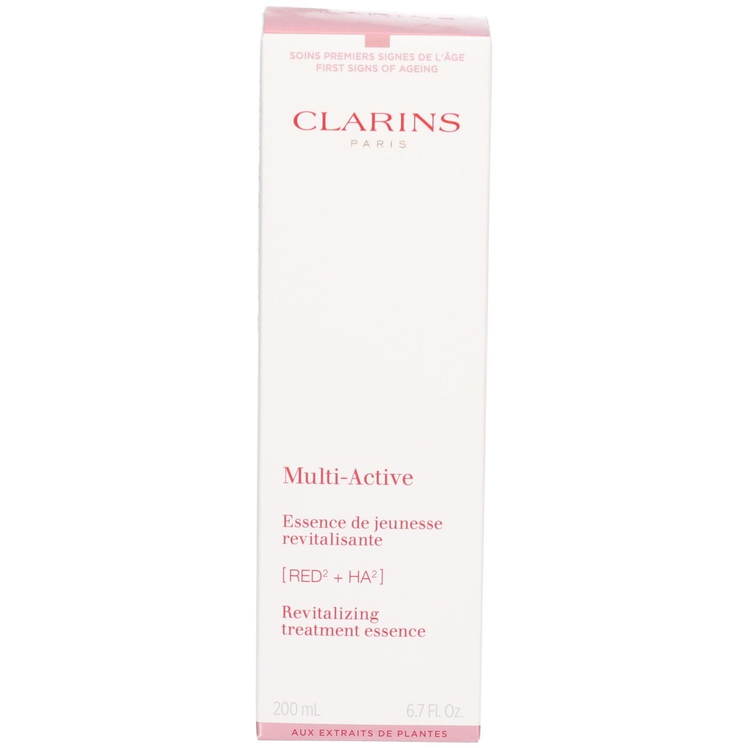 Verpackung der Clarins Multi-Active Essence, eine weiße Box mit rosa Akzenten und Produktinformationen.