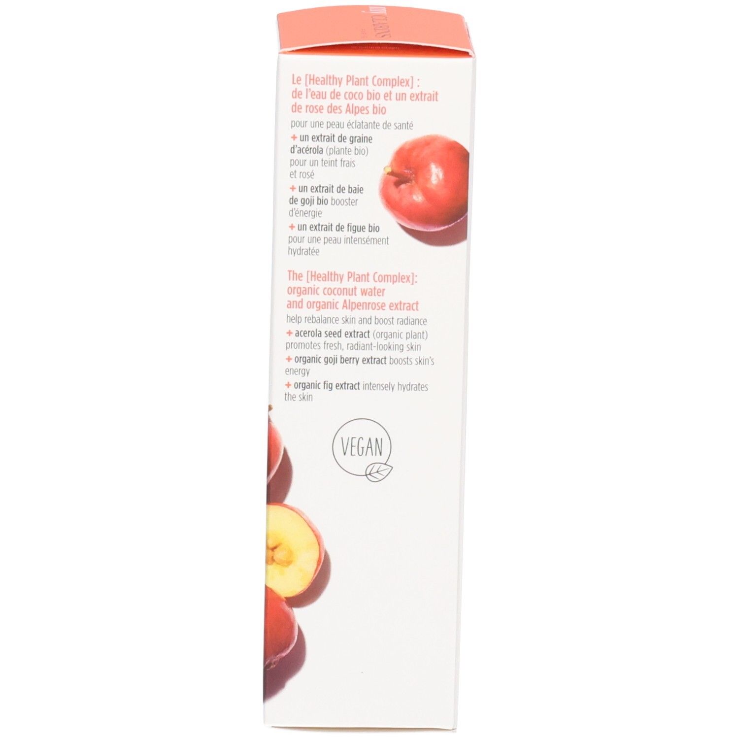 Seite einer Kartonverpackung mit Orangen, "Healthy Plant Complex" und "VEGAN" Siegel.