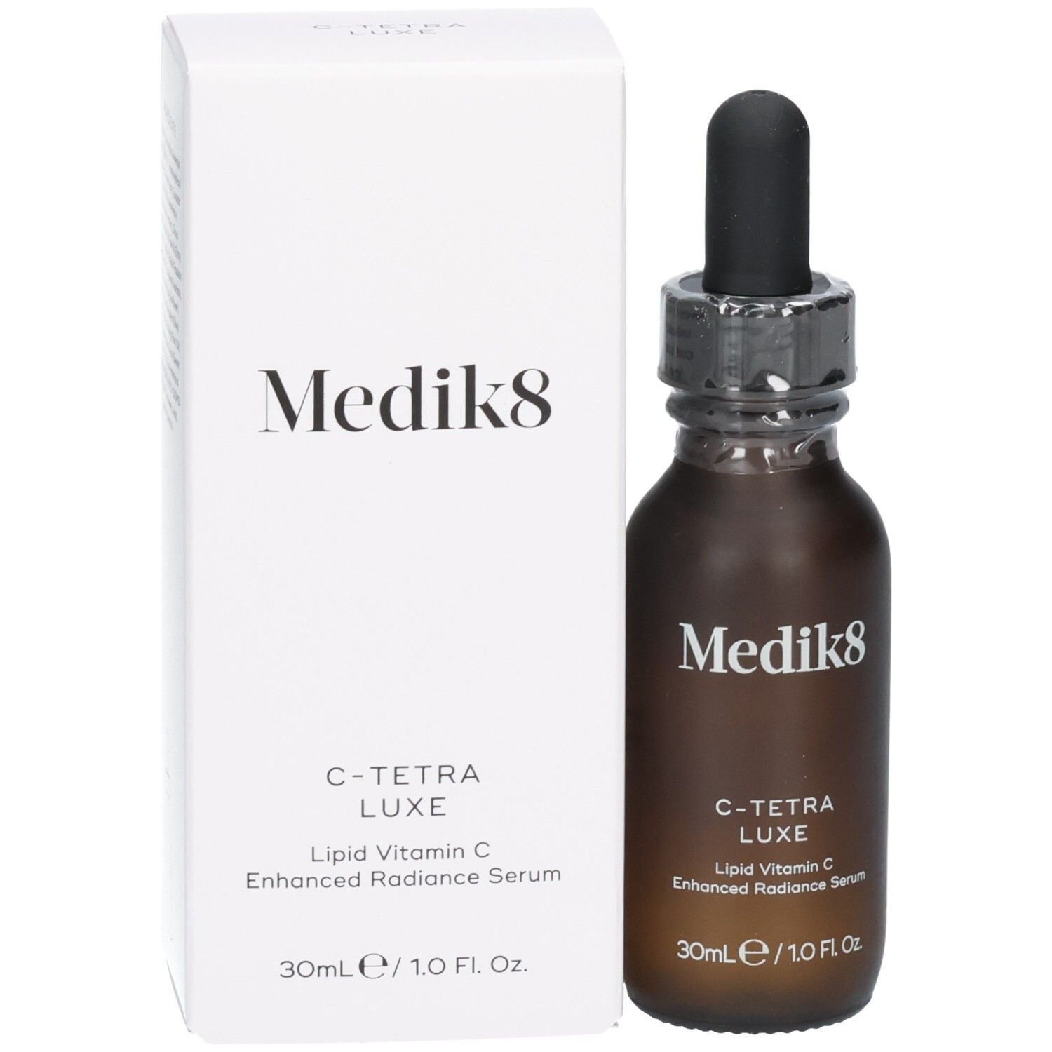 Medik8 C-Tetra Luxe Serumflasche neben der Produktverpackung. 30ml.