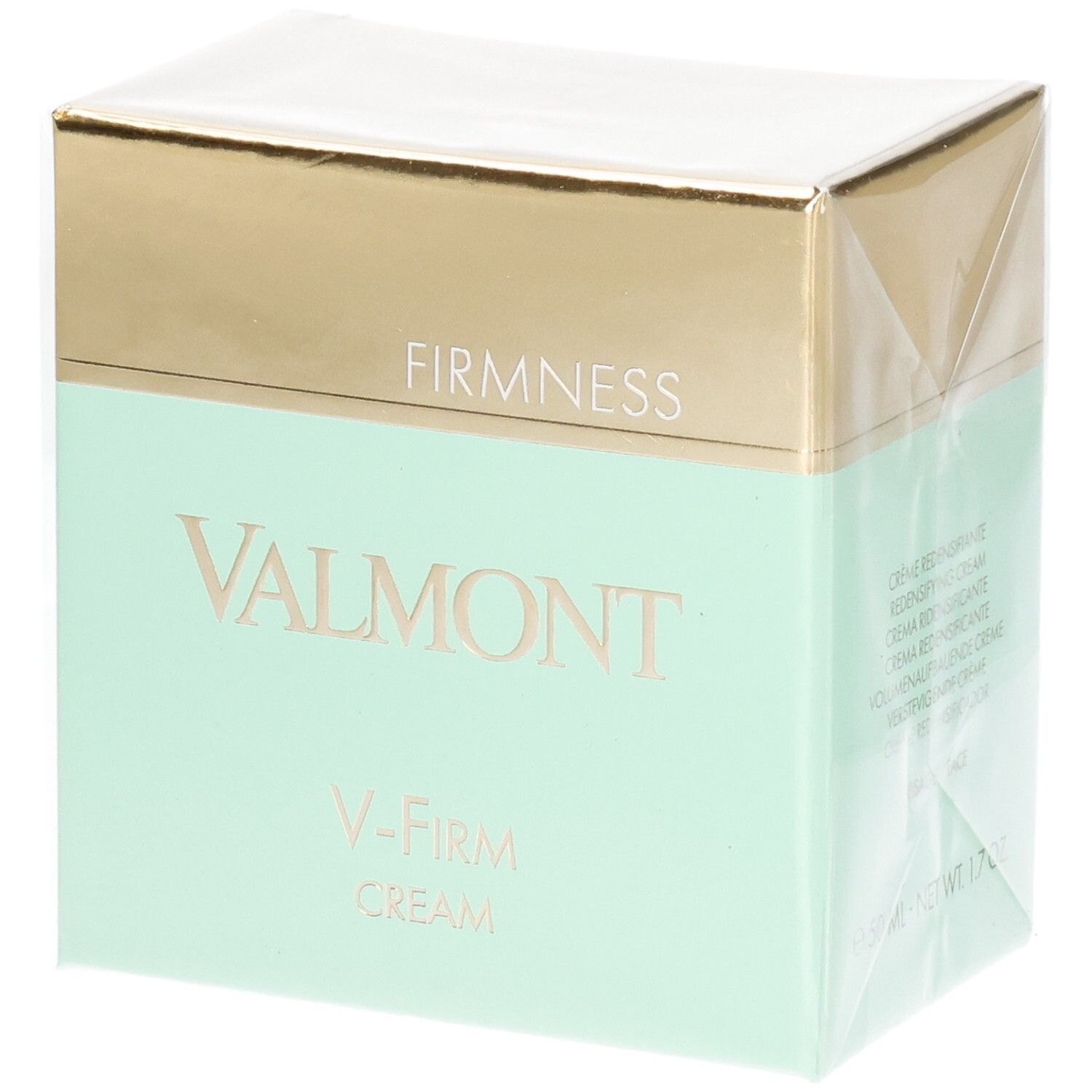 Valmont V-Firm Cream Verpackung mit goldener und mintgrüner Banderole. "FIRM NESS" und "VALMONT" sind auf der Vorderseite aufgedruckt.