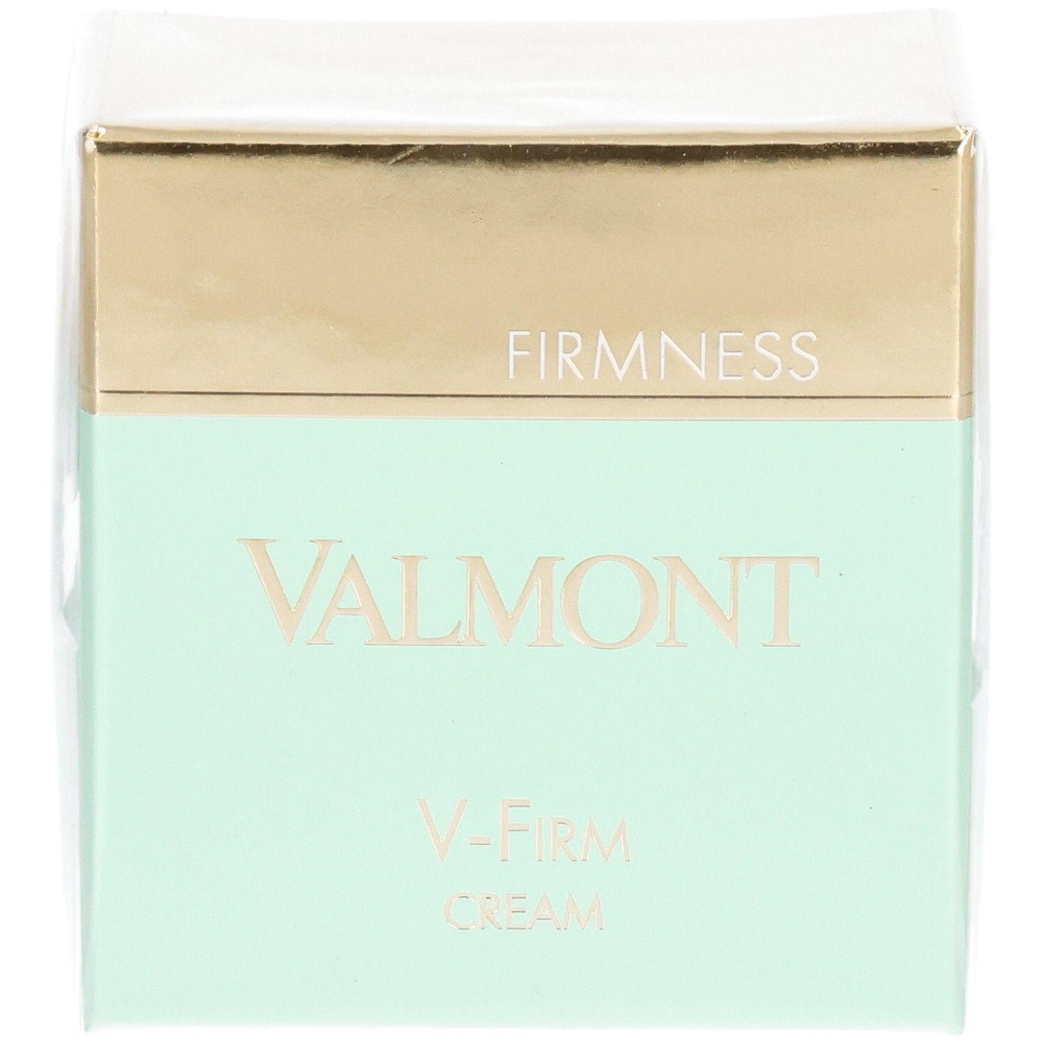 Valmont V-Firm Cream Verpackung mit goldener und mintgrüner Banderole. "FIRM NESS" und "VALMONT" sind auf der Vorderseite aufgedruckt.