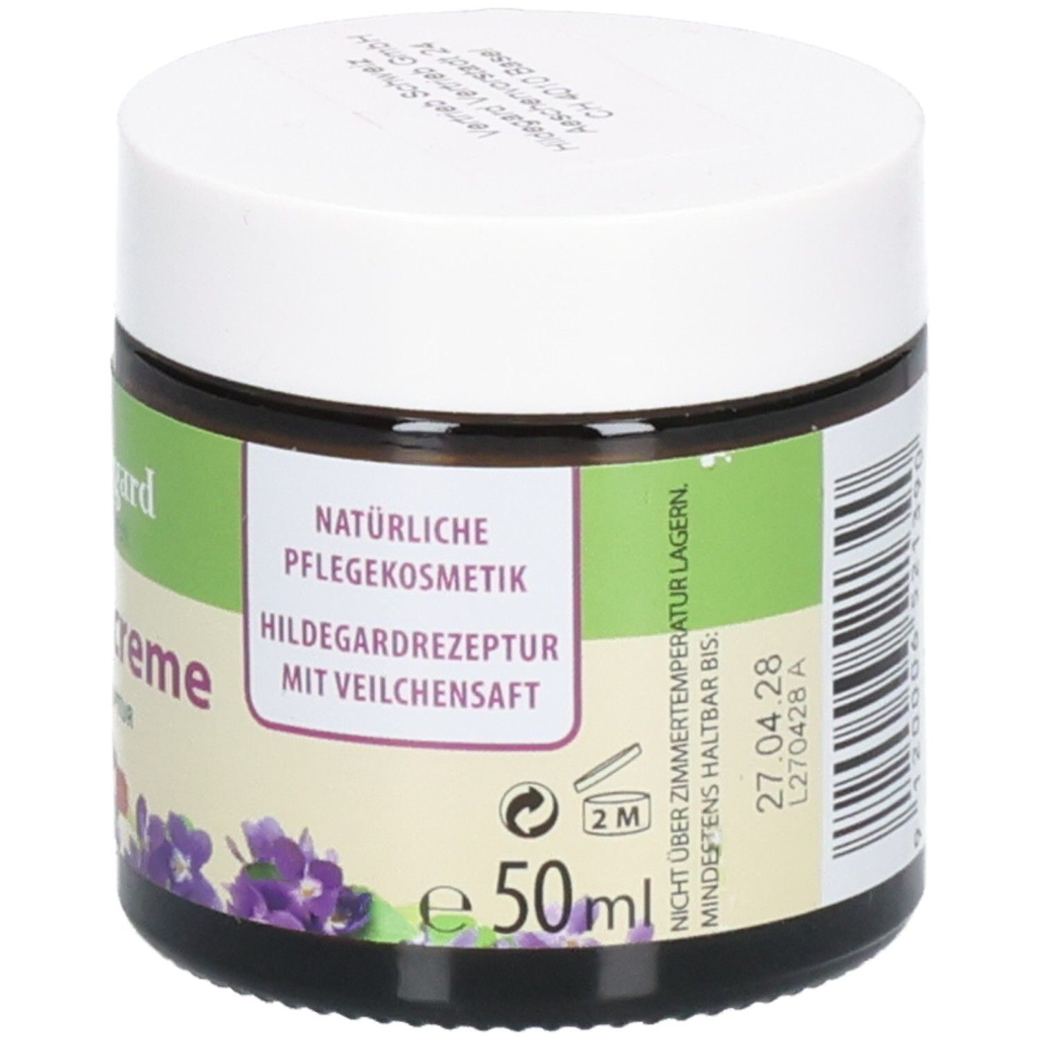 Braunes Glas mit weißem Deckel. Aufschrift: Naturliche Pflegekosmetik. Hildegardrezeptur mit Veilchensaft. 50ml. Haltbarkeit.