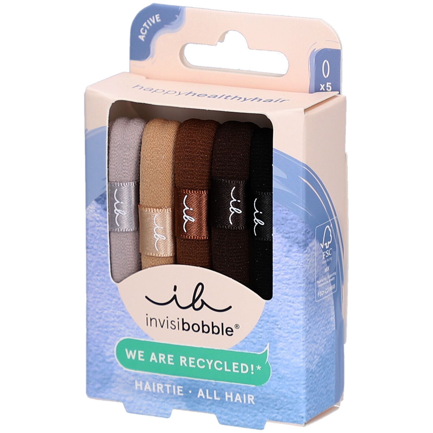 Packung mit fünf Haargummis in verschiedenen Brauntönen. Marke: Invisibobble. Aufschrift: "WE ARE RECYCLED!"