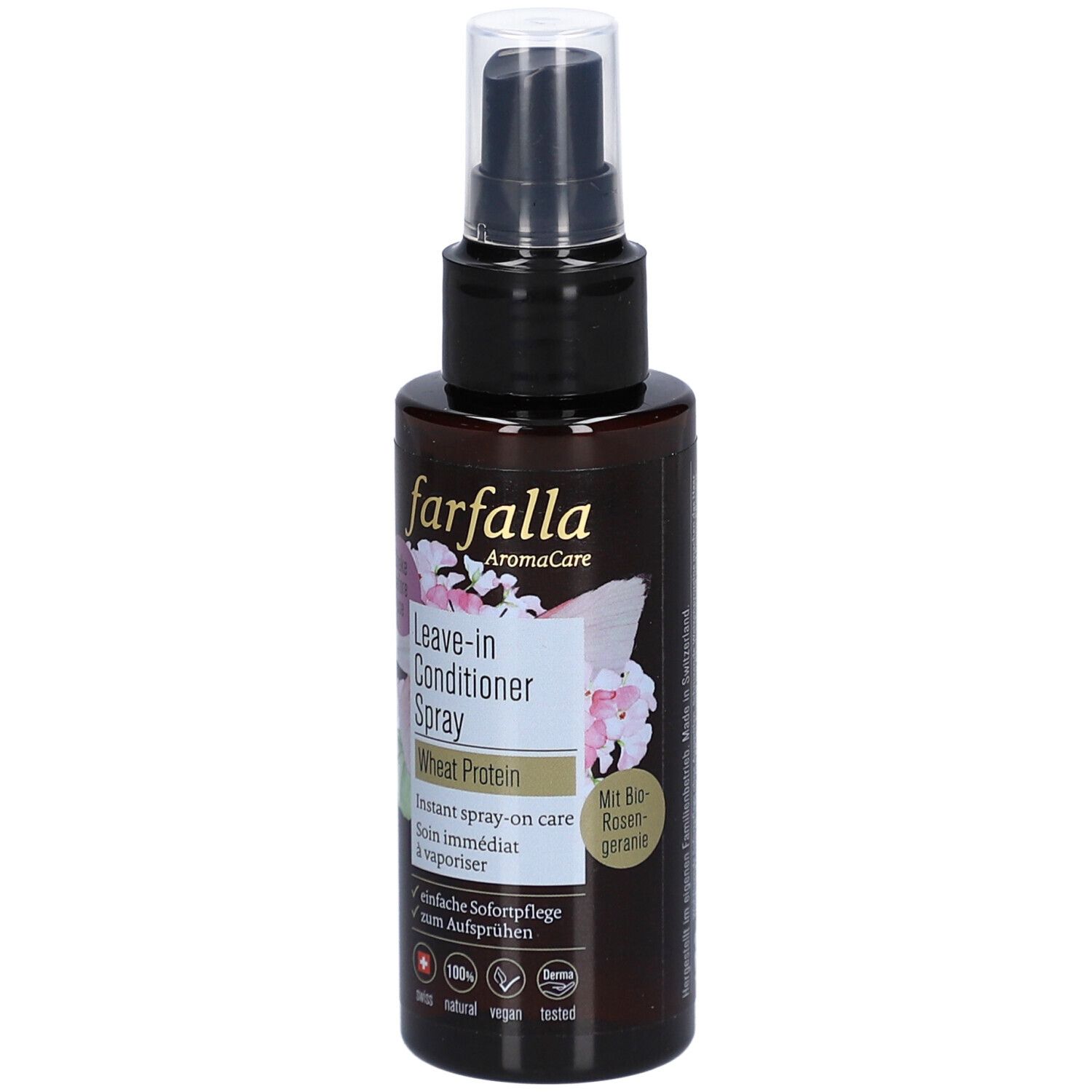 Braune Sprühflasche mit schwarzem Sprühkopf. Aufschrift: farfalla, Leave-in Conditioner Spray, Wheat Protein. Mit Blüten-Dekor.