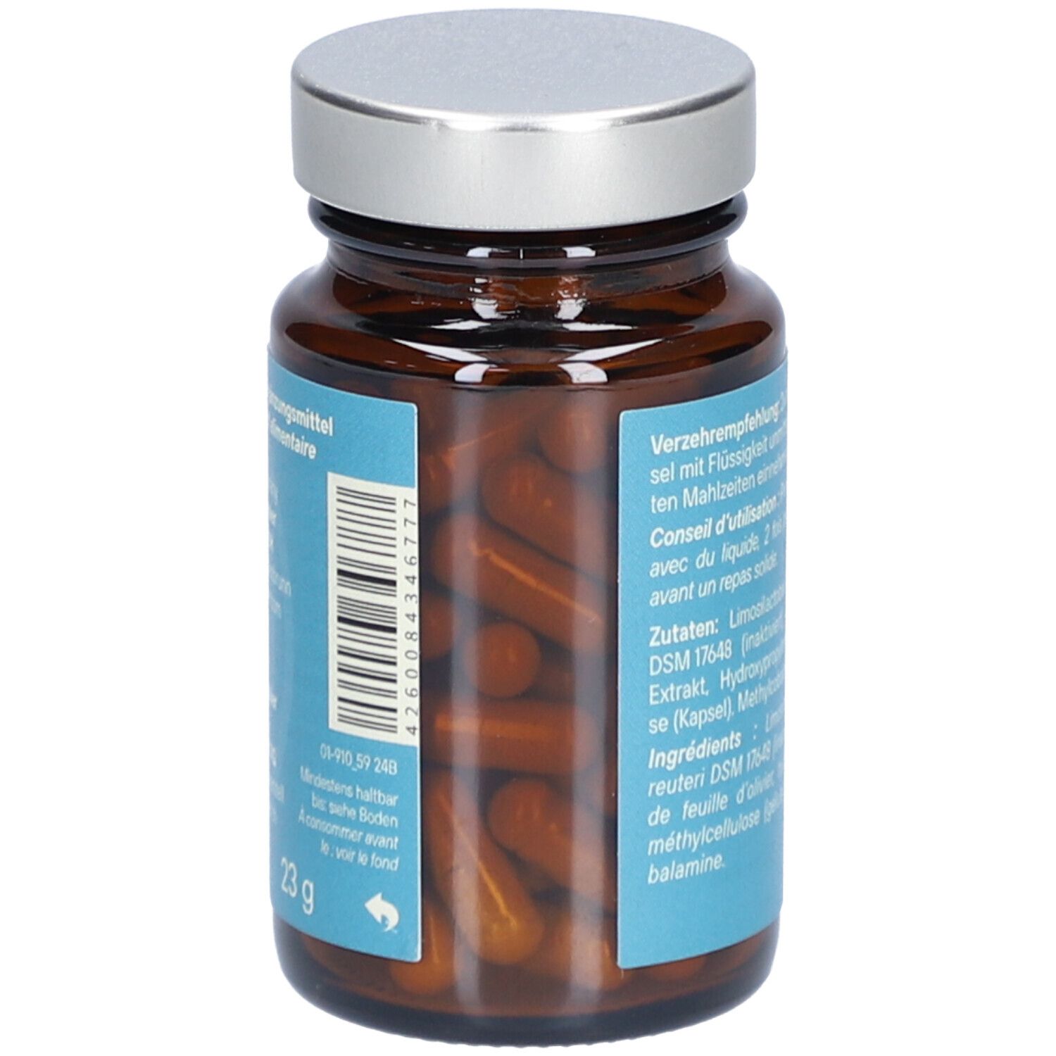 Braune Glasflasche mit silbernem Deckel, gefüllt mit braunen Kapseln. Blaue Etiketten mit Text und Barcode. 23g.