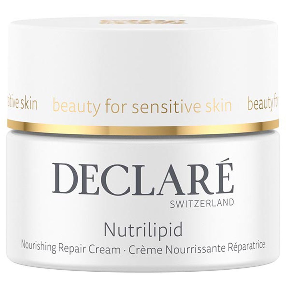 Weißer Tiegel mit goldfarbenem Deckel. Aufschrift: DECLARÉ, Nutrilipid, Nourishing Repair Cream. Für empfindliche Haut.