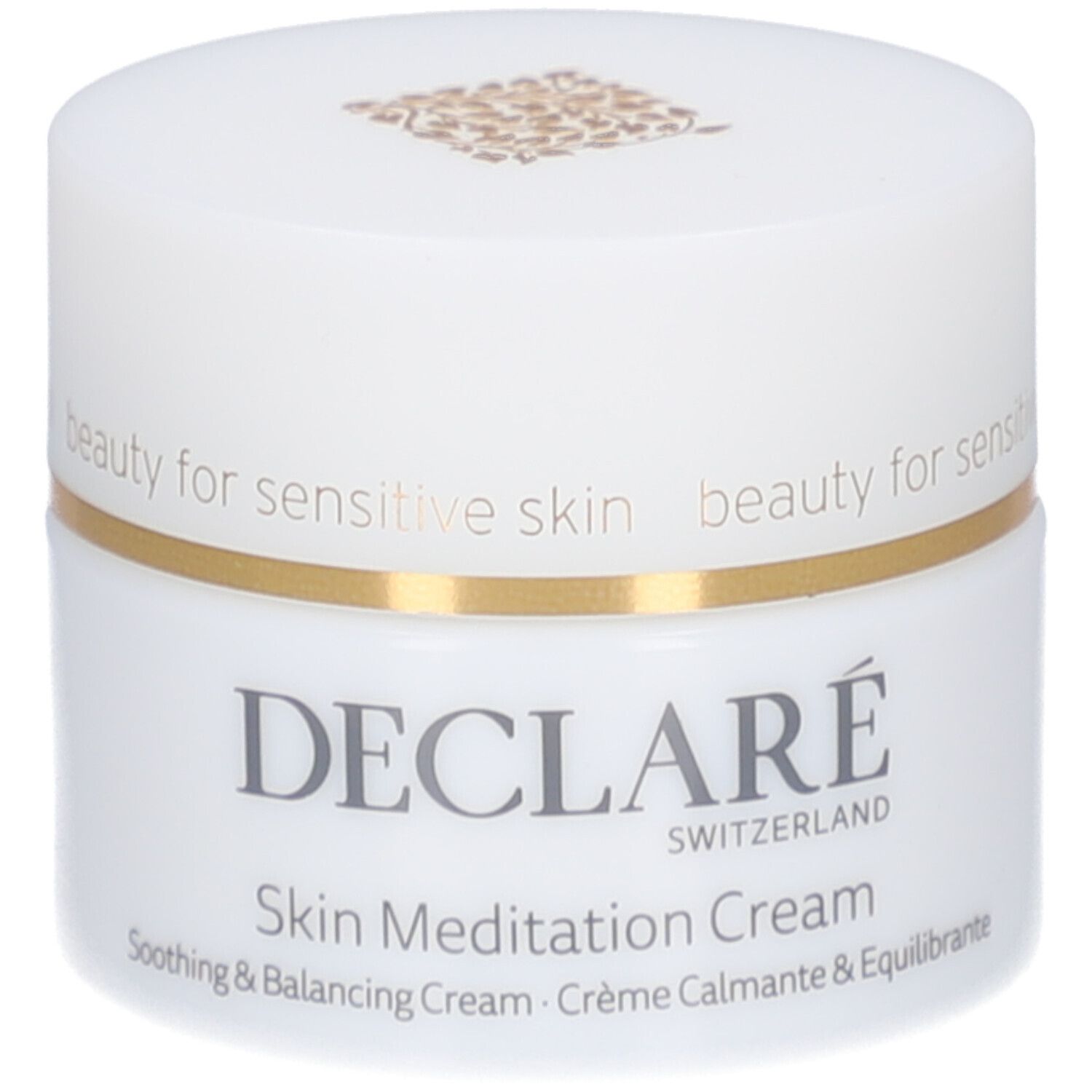 Weißer Creme-Tiegel mit goldenem Rand. Aufschrift: DECLARÉ SWITZERLAND, Skin Meditation Cream. Beruhigende & ausgleichende Creme.