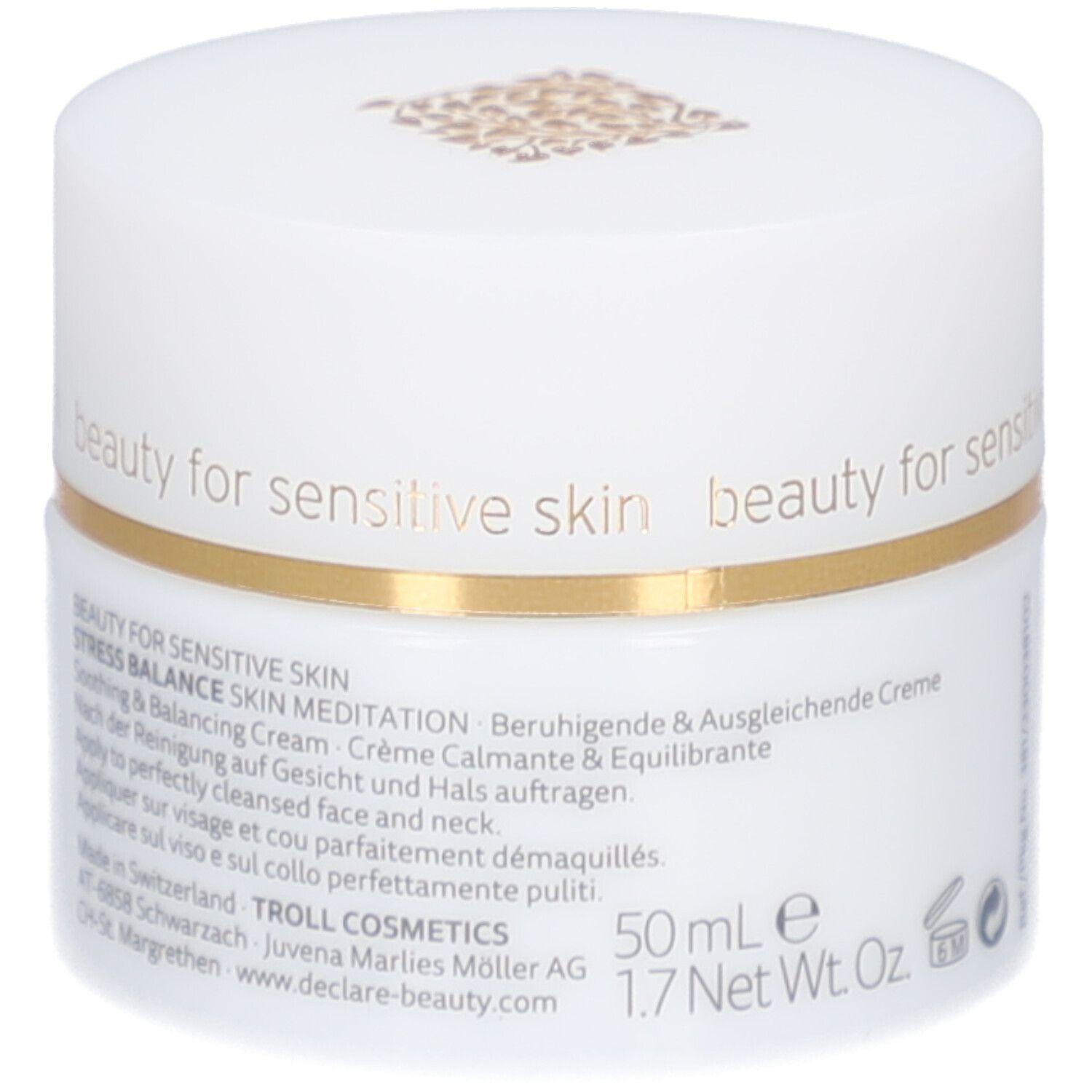 Weißer Creme-Tiegel mit goldenem Rand. Aufschrift: DECLARÉ SWITZERLAND, Skin Meditation Cream. Text auf der Seite.