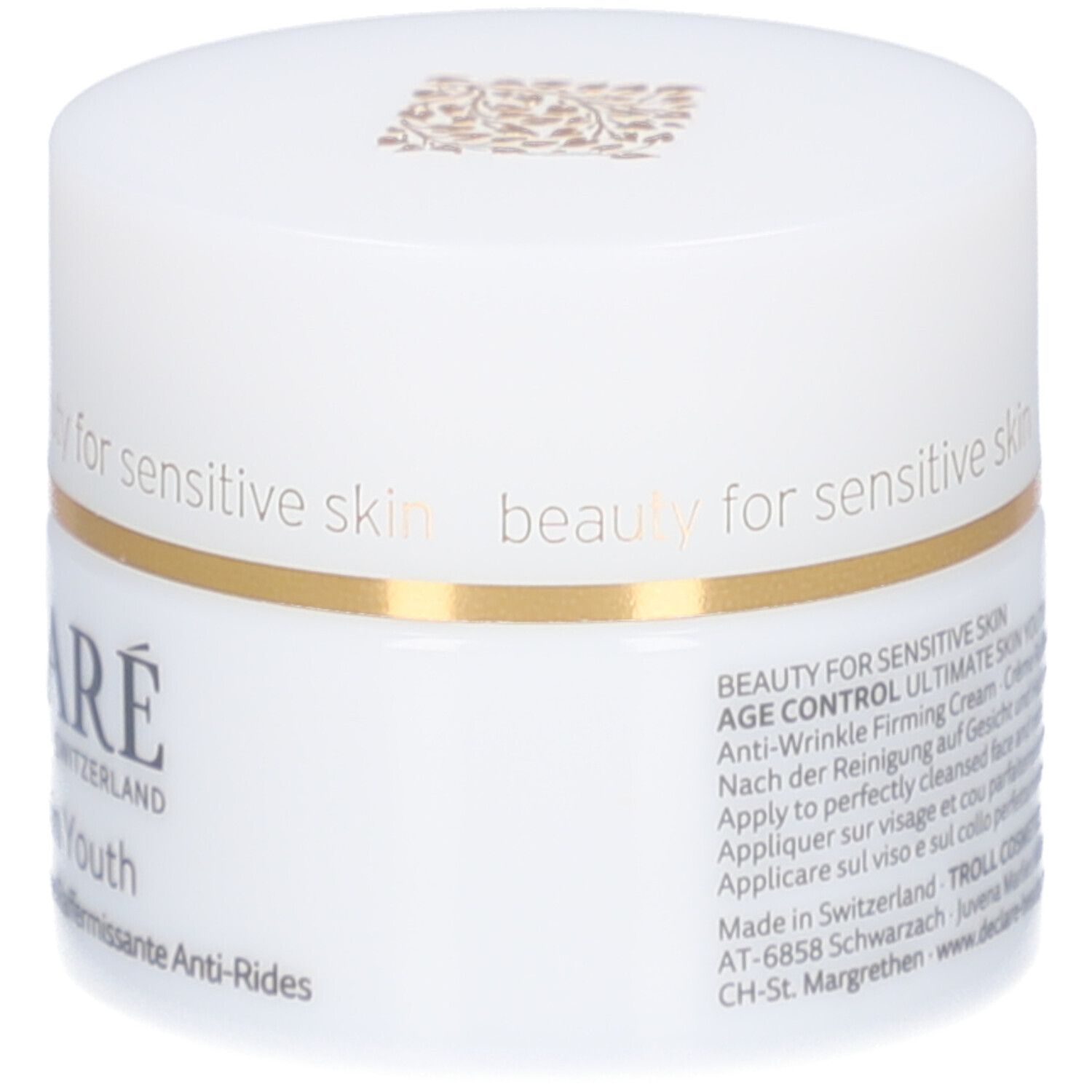 Weißer Tiegel mit Deckel. Goldfarbener Ring. Aufschrift: DECLARE, Ultimate Skin Youth Anti-Wrinkle Firming Cream.