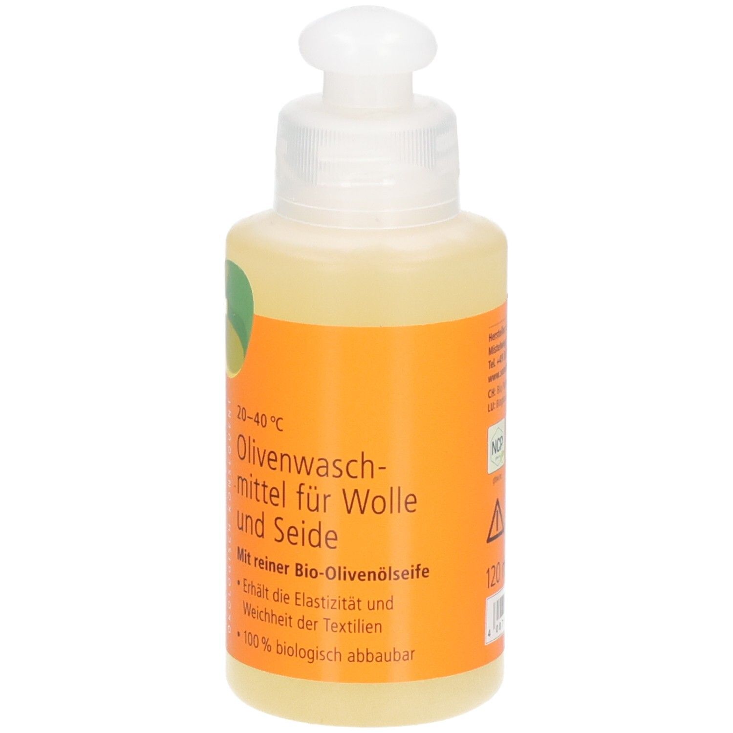 Flasche mit Olivenwaschmittel für Wolle und Seide. Orangefarbenes Etikett mit Produktinformationen.