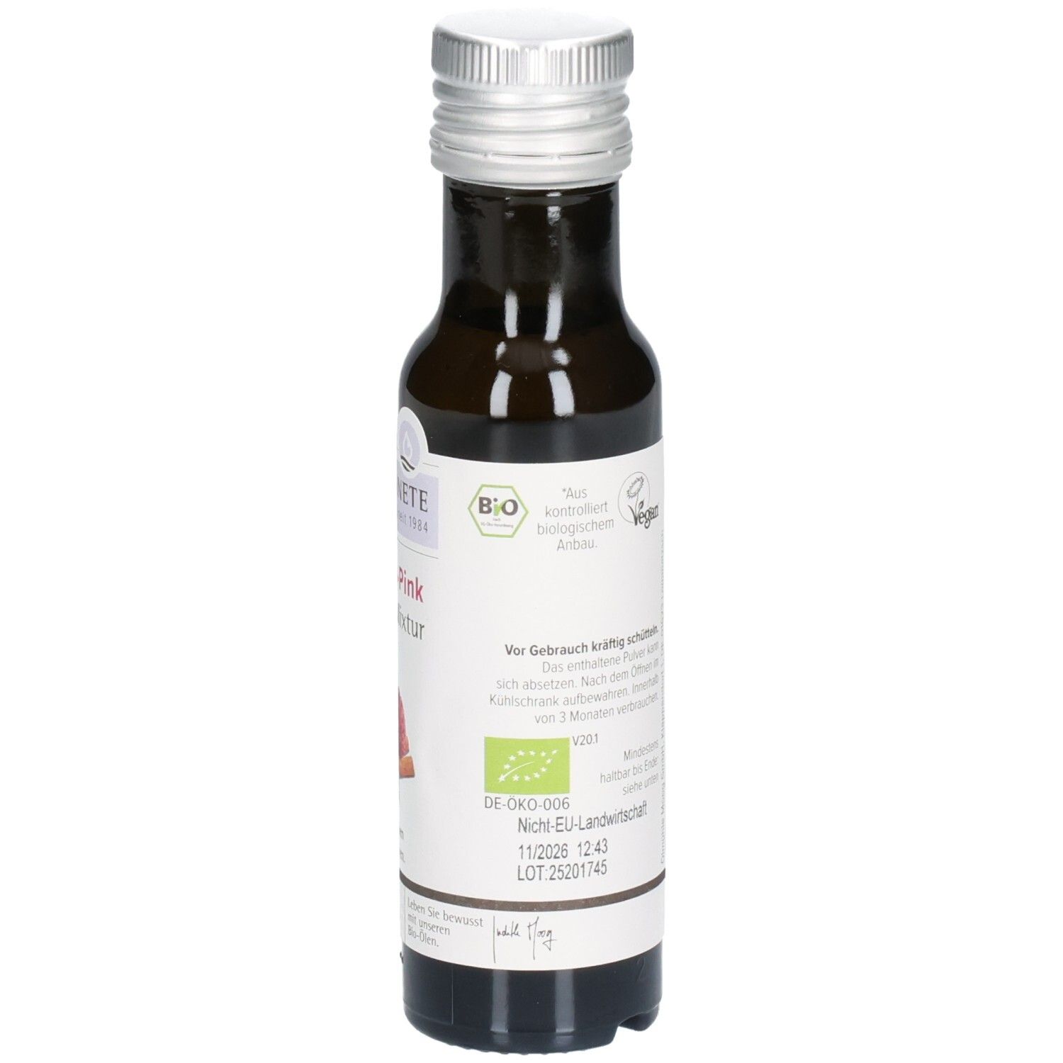 Flasche mit Etikett. Produktname, Bio-Siegel, Vegan-Logo. Text: Vor Gebrauch kräftig schütteln.