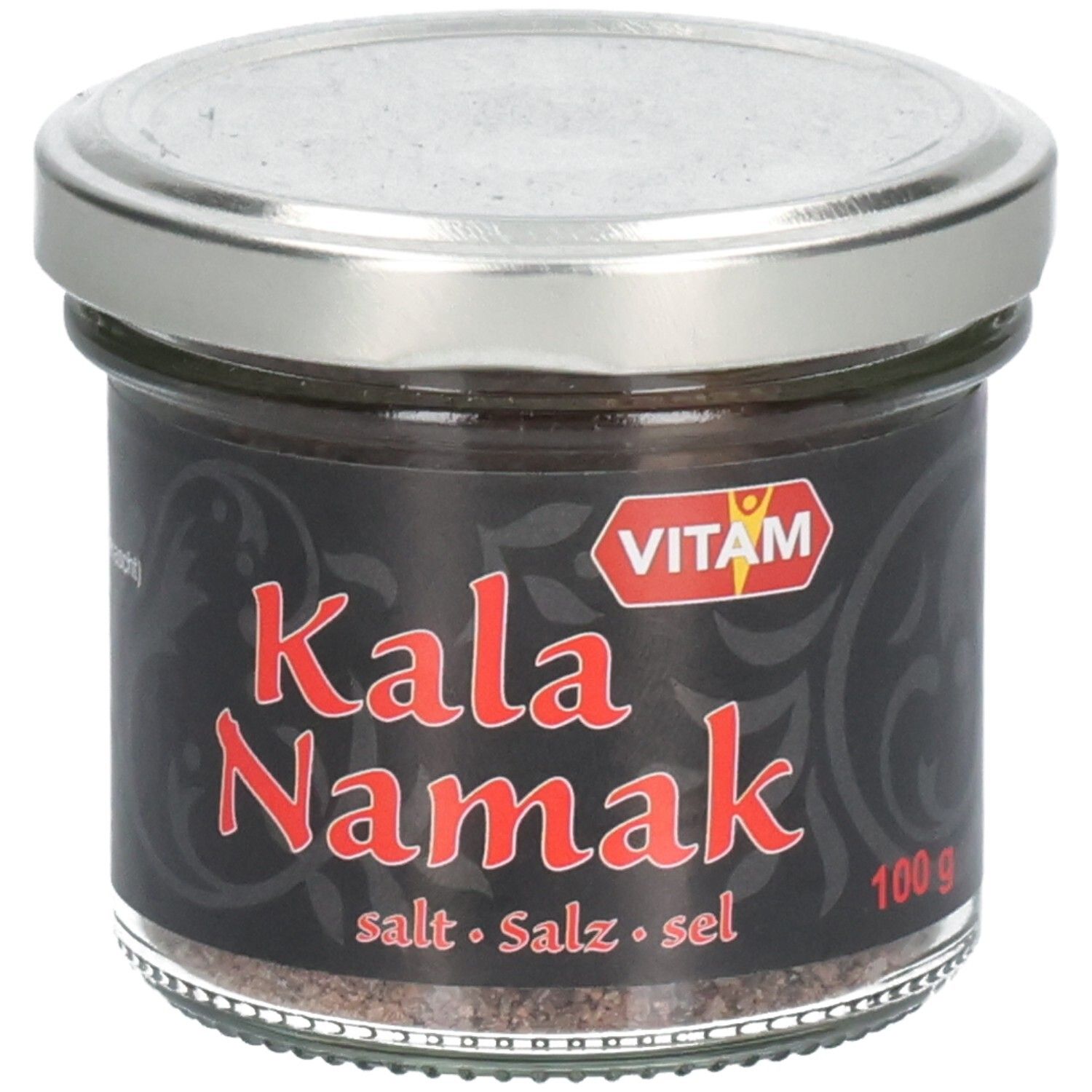 Glas mit schwarzem Etikett. Roter Schriftzug "Kala Namak". Marke VITAM. Deckel silberfarben. Salz sichtbar.