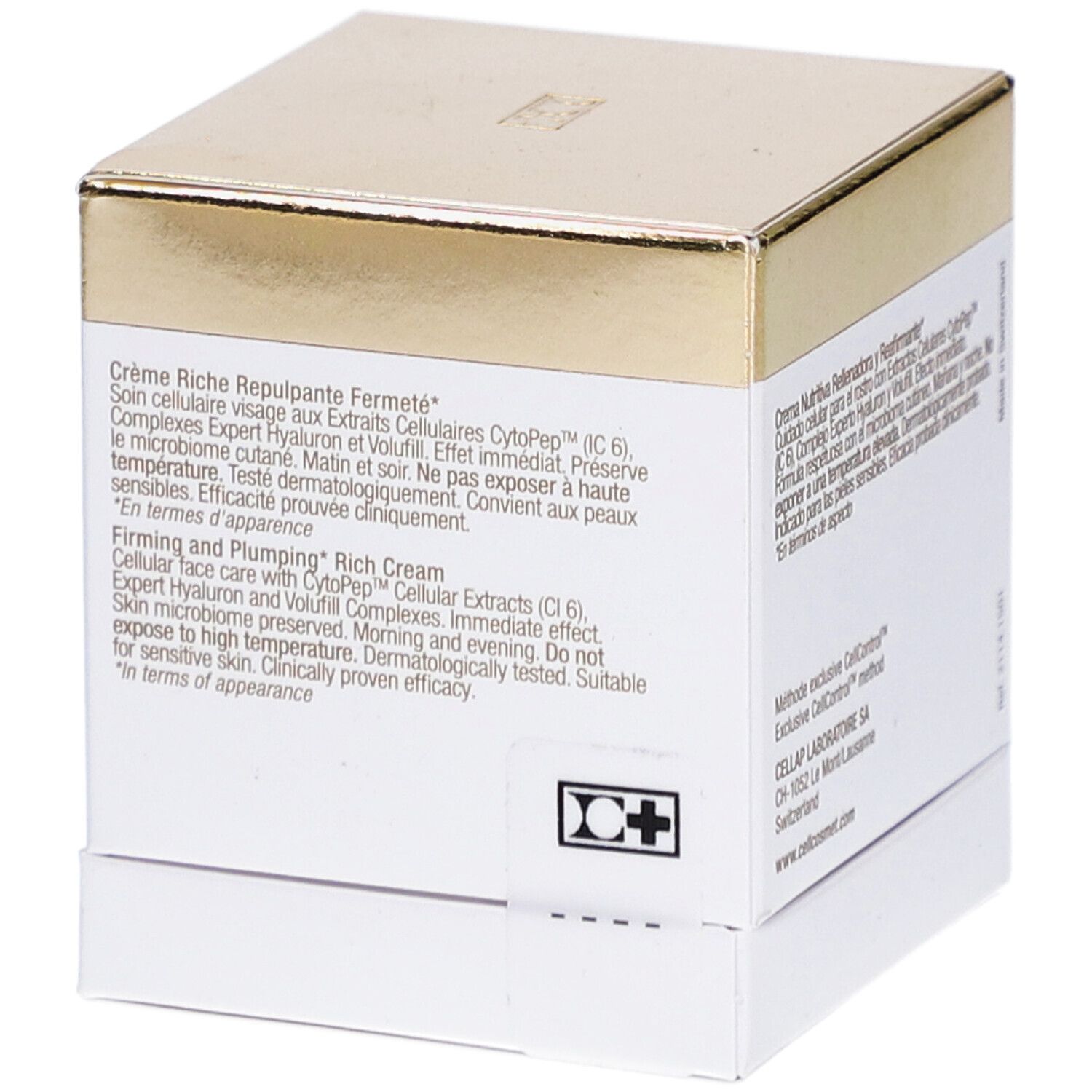 Weiße Schachtel mit goldfarbenem Deckel. Text: Crème Riche Repulpante Fermeté. Firming and Plumping Rich Cream.