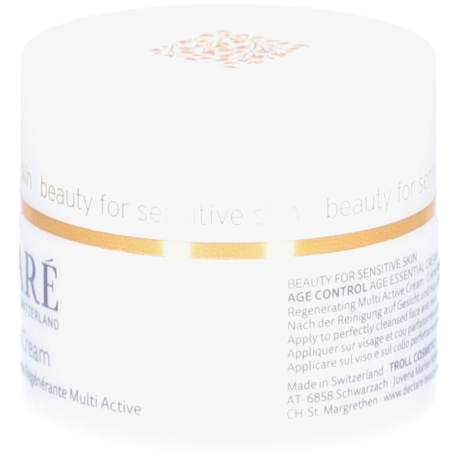 Weißer Tiegel mit goldfarbenem Ring. DECLARÉ Age Essential Cream. Text auf der Seite. Für empfindliche Haut.