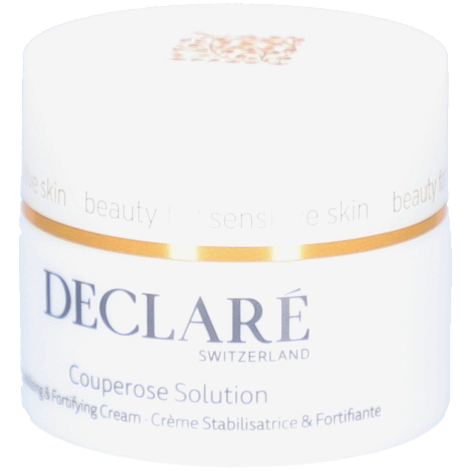 Weißer Tiegel mit goldfarbenem Ring. Aufschrift: DECLARÉ SWITZERLAND Couperose Solution. Stabilisierende & stärkende Creme.
