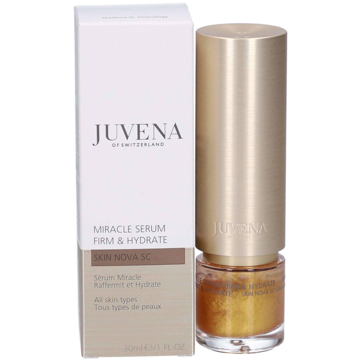 Serumflasche mit goldenem Deckel und Verpackung. Marke: Juvena.