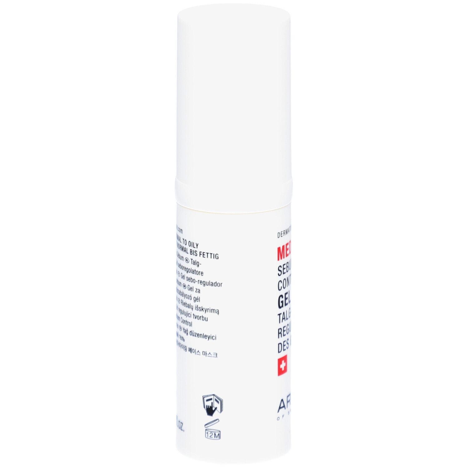 Weißer Zylinder mit Text. MED Sebum Control Gel. Schweizer Kreuz. ARTEMIS. Text in mehreren Sprachen.