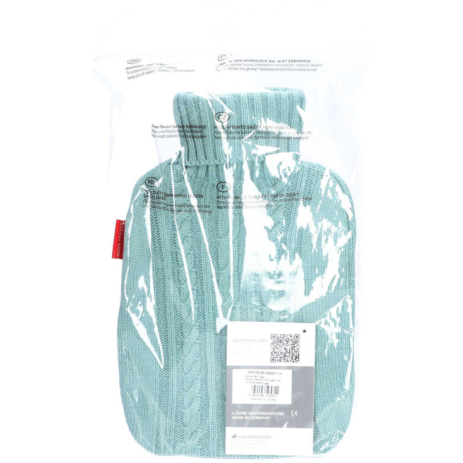 Wärmflasche mit Strickbezug, pastellblau, in Folienverpackung, Etikett.