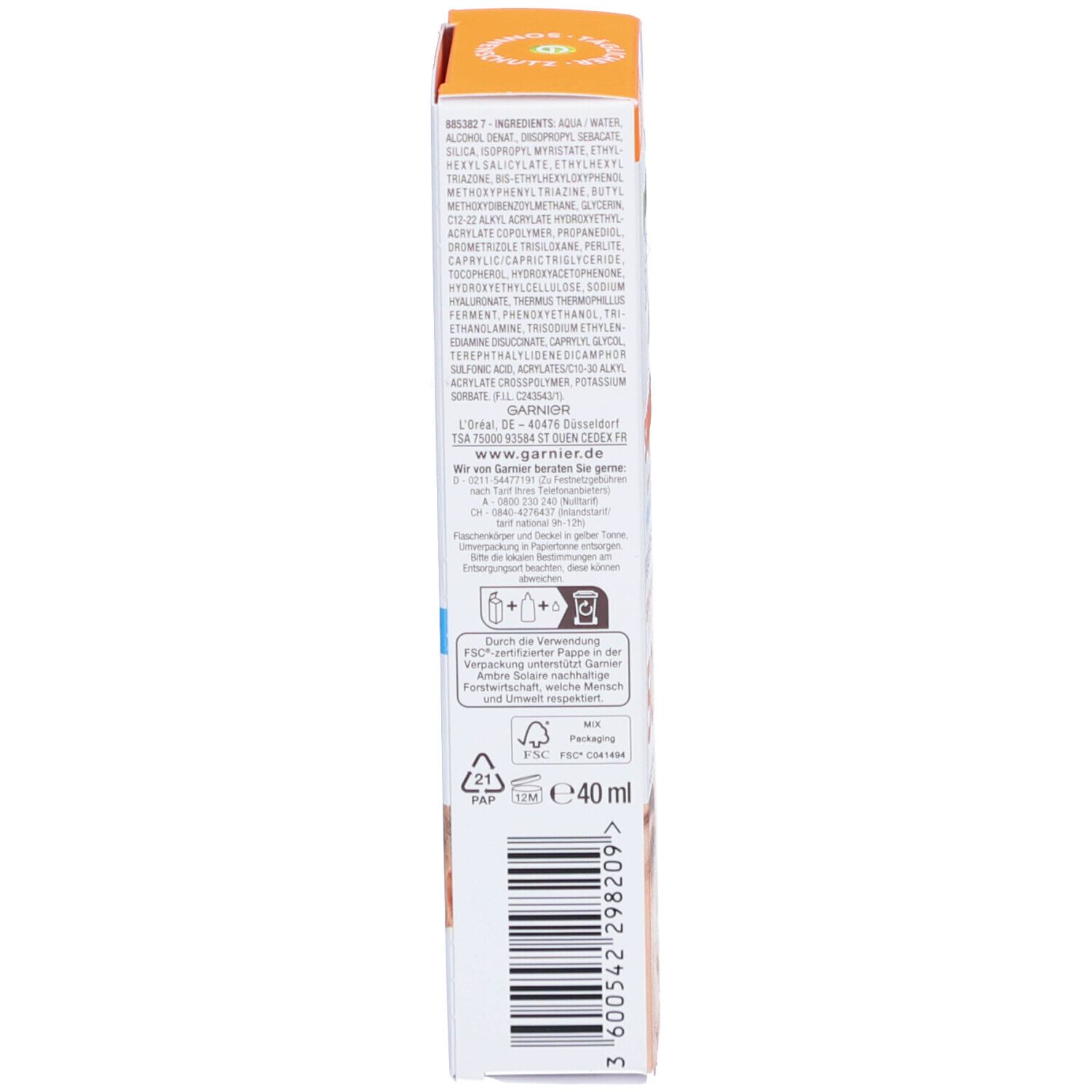 Seite der Garnier Ambre Solaire Verpackung. Text: Inhaltsstoffe, Recycling-Symbole, Volumen 40ml.
