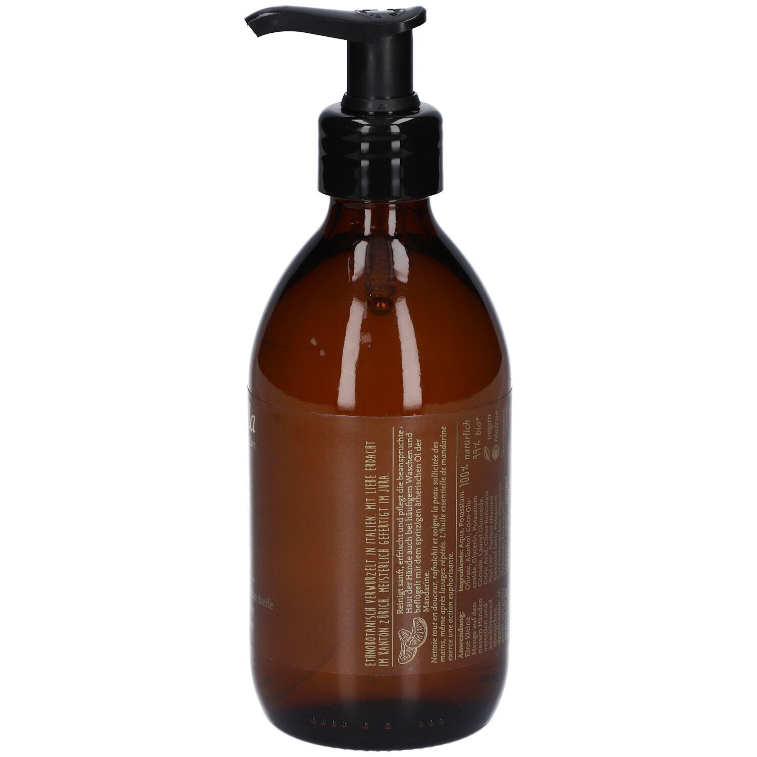 Braune Glasflasche mit schwarzem Pumpkopf. Rückseite mit Text. Etikett mit Informationen.