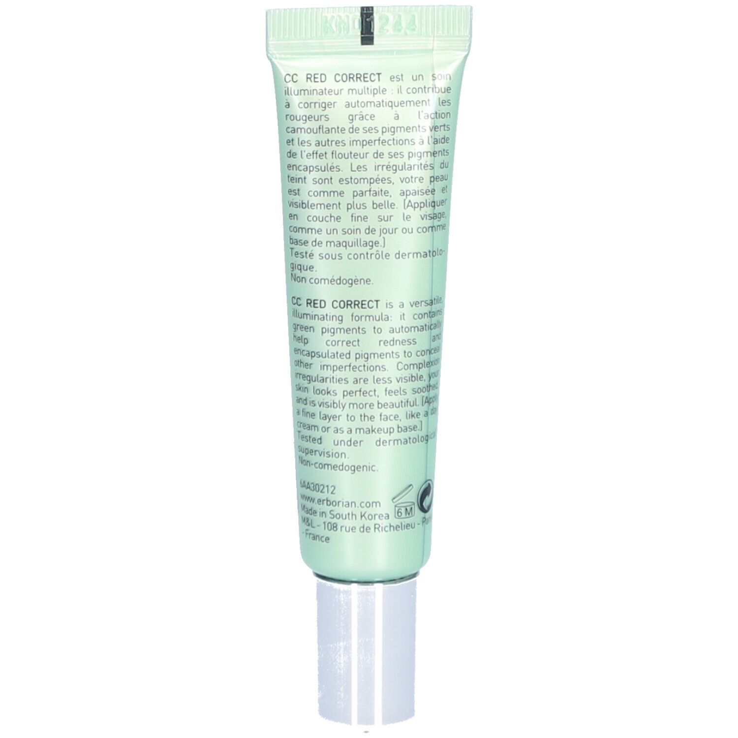 Rückseite der grünen Tube. Text in mehreren Sprachen. Enthält Informationen zum Produkt und Hersteller.