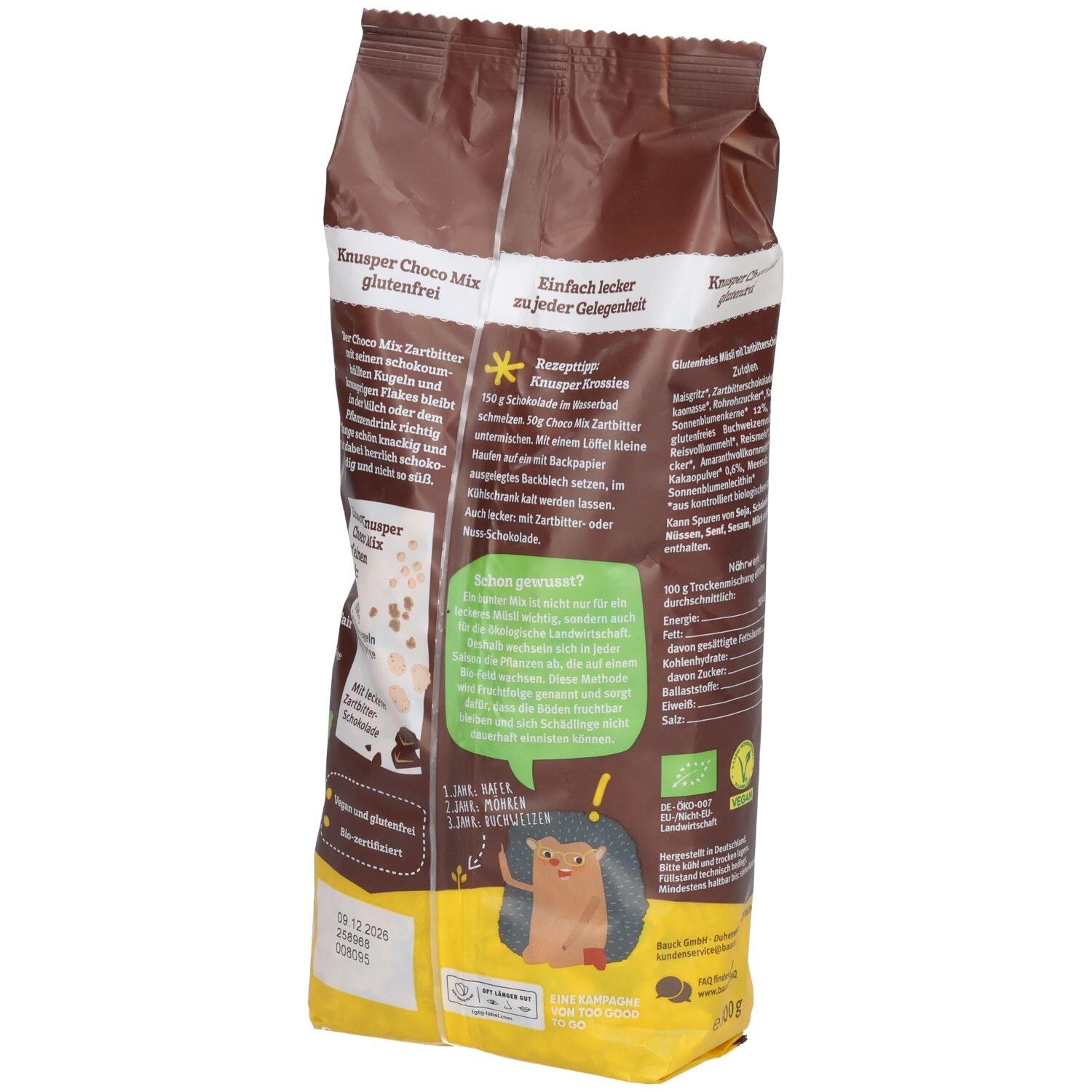Rückseite der braunen Tüte. Text "KNUSPER Choco Mix glutenfrei". Abbildung eines Igels. Bio-Siegel. Text und Nährwertangaben.