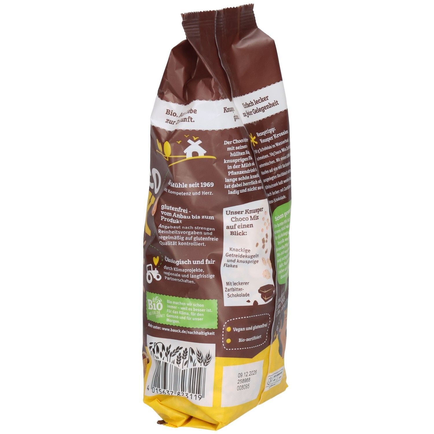 Braune Tüte, seitliche Ansicht. Text "KNUSPER Choco Mix glutenfrei". Bio-Siegel. Text und Nährwertangaben.