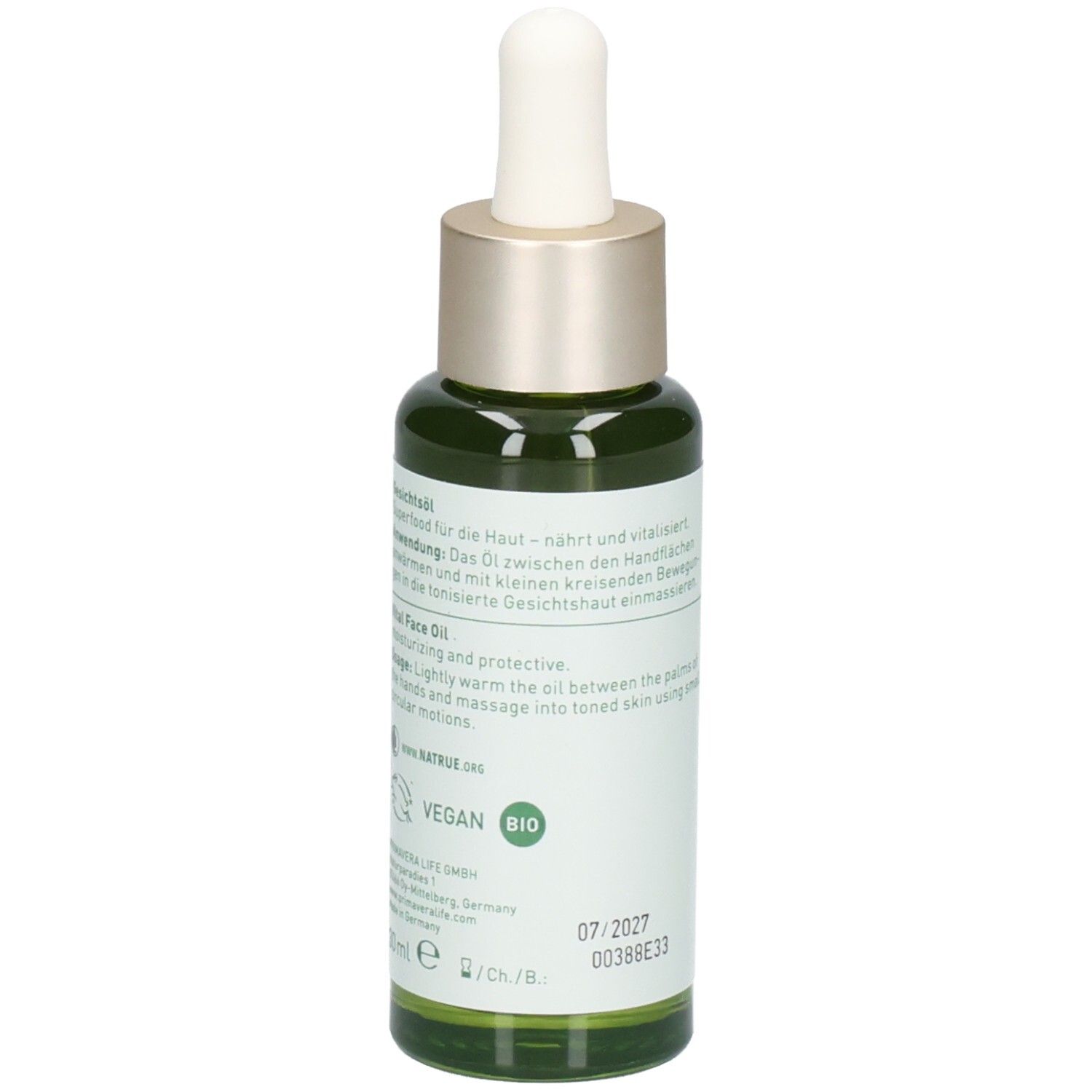 Seitenansicht einer grünen Glasflasche mit Pipette, Etikett mit "VEGAN BIO" Siegel und Produktinformationen.