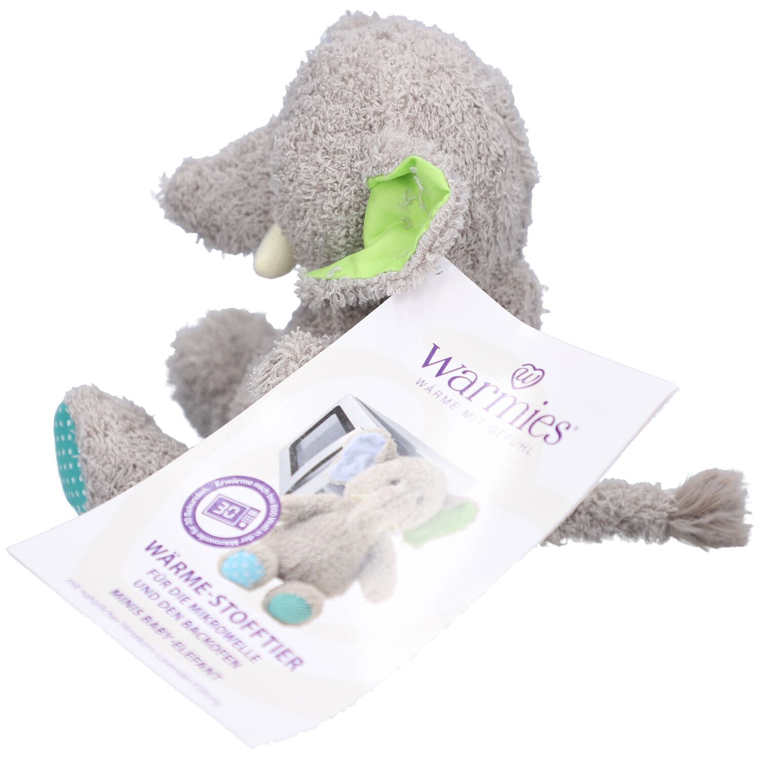 Grauer Stoffelefant mit Anhänger. Aufdruck: Mikrowelle, Baby-Elefant. Logo Warmies®.