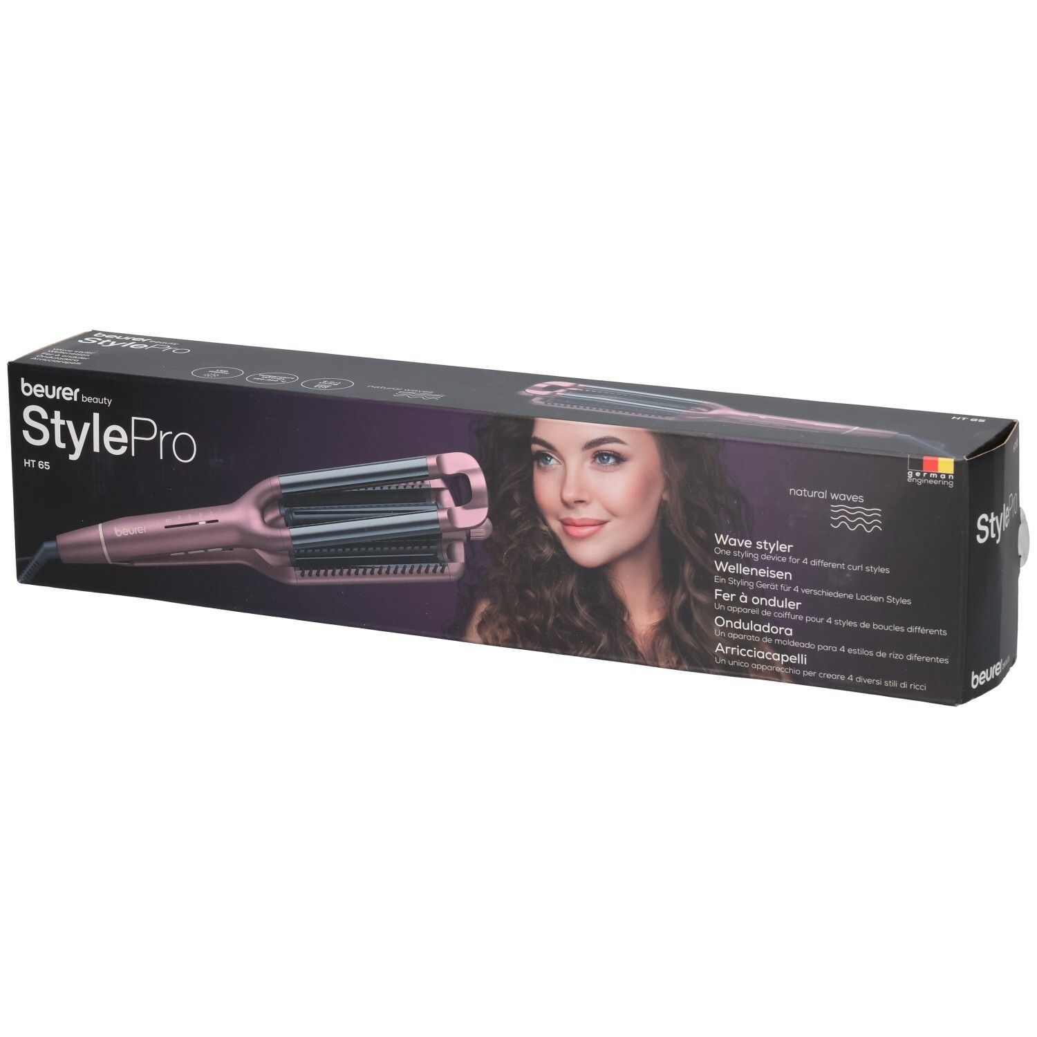 Beurer StylePro HT 65 Welleneisen in Verpackung. Rosa Gerät mit Wellenplatten. Aufdrucke: Wave Styler, natürliche Wellen.