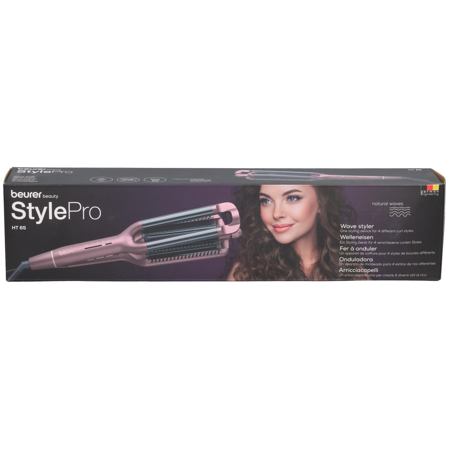 Beurer StylePro HT 65 Welleneisen in Verpackung. Rosa Gerät mit Wellenplatten. Aufdrucke: Wave Styler, natürliche Wellen.
