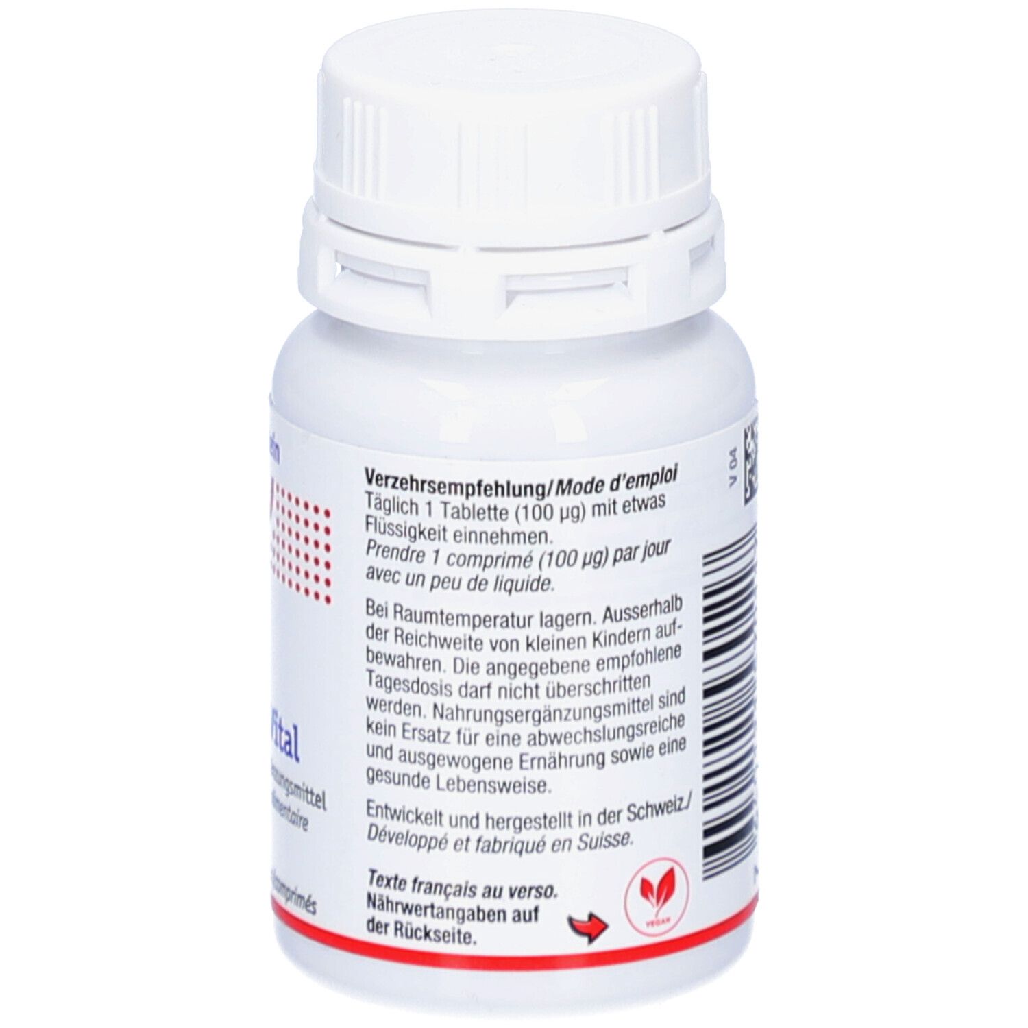 Rückseite der Tablettenflasche. Text in deutscher und französischer Sprache. Vegan-Logo. Weißer Deckel. Dosierung.