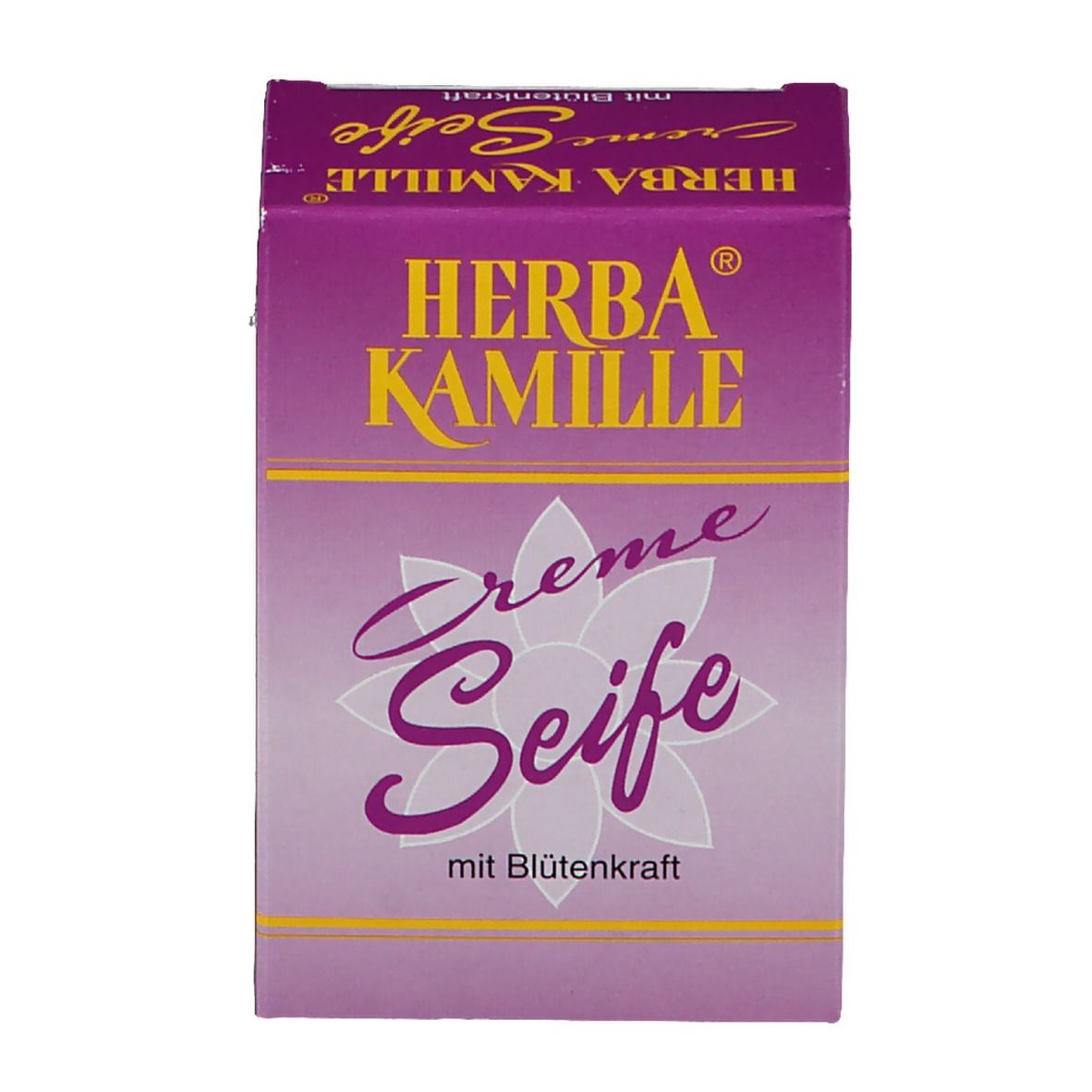 Herba Kamille Creme Seife in lila Verpackung. Schriftzug in Gelb. Blüte-Design. Draufsicht.