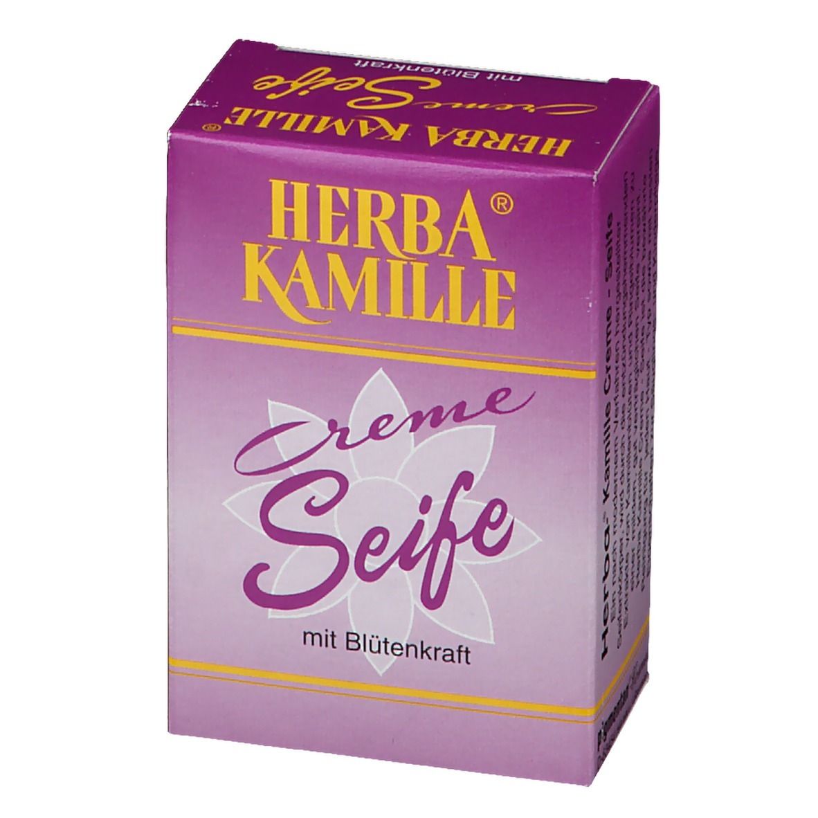 Herba Kamille Creme Seife in lila Verpackung. Schriftzug in Gelb. Blüte-Design. Seitenansicht.