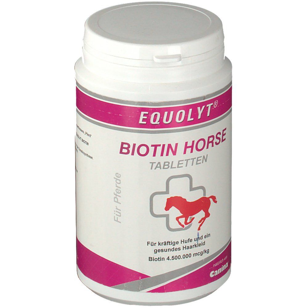 Weiße Dose mit rosa Etikett. Aufschrift: EQUOLYT BIOTIN HORSE TABLETTEN. Logo: rotes Pferd im Kreuz. Marke: Canina. Deckel oben.