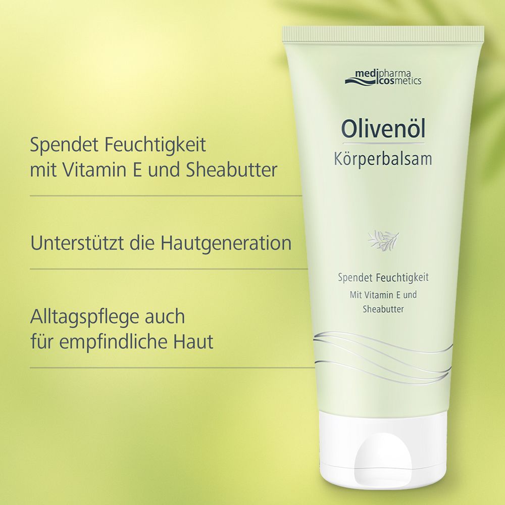 Grüne Tube mit Olivenöl Körperbalsam. Text: Spendet Feuchtigkeit, mit Vitamin E und Sheabutter, unterstützt die Hautgeneration.