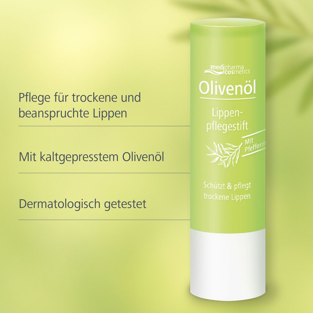 Lippenpflegestift, grün-weiß. Text: Pflege für trockene und beanspruchte Lippen. Mit kaltgepresstem Olivenöl. Dermatologisch getestet.