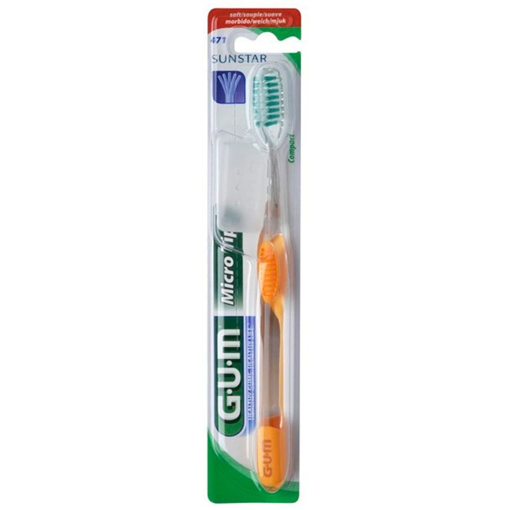 GUM MicroTip Zahnbürste, orangefarbener Griff, grüne Borsten, in Verpackung.
