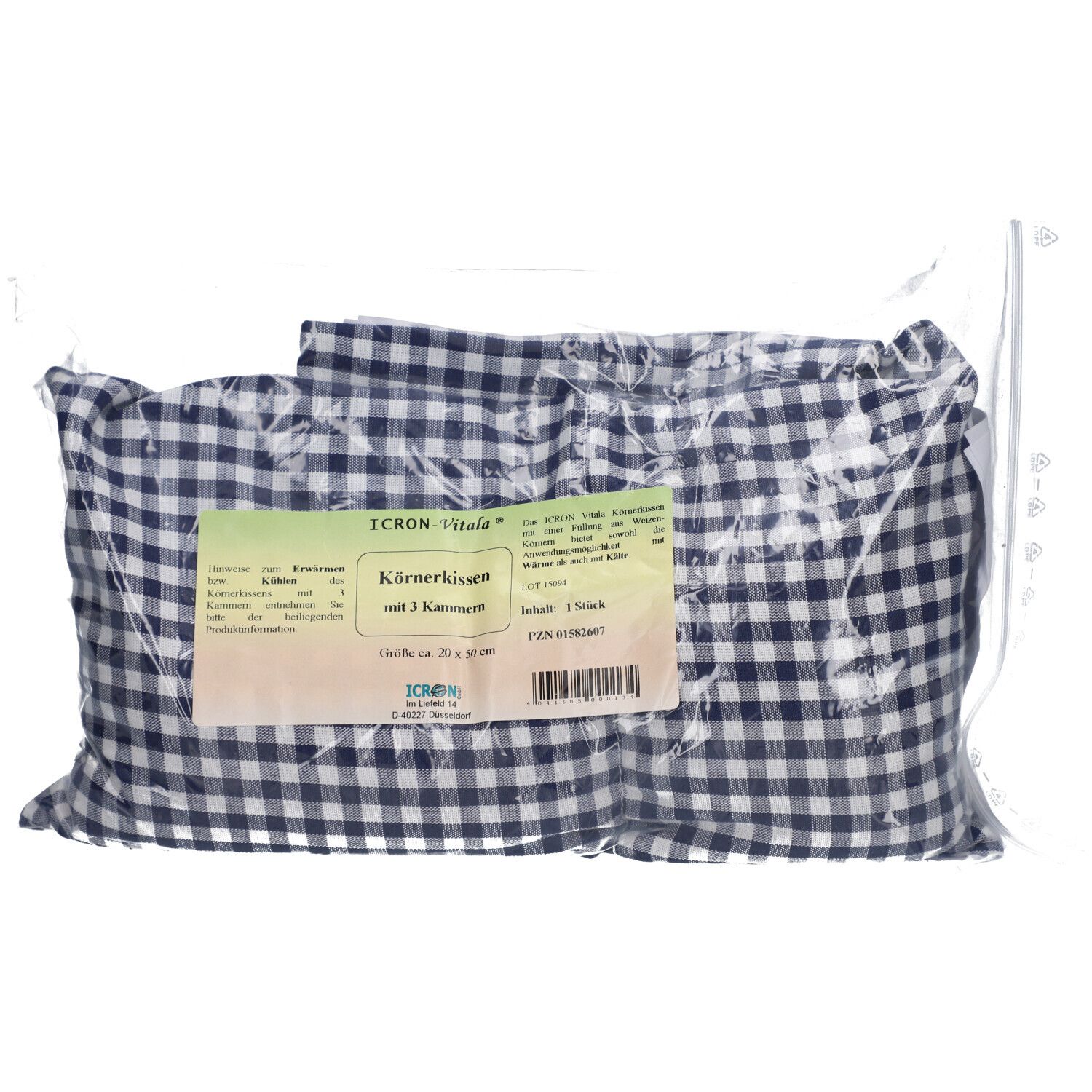 Körnerkissen in blau-weißem Karomuster, verpackt in Folie. Etikett mit Produktinformationen und Logo.