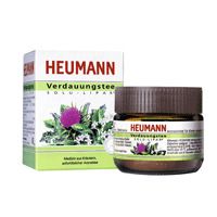 Verpackung und Glas mit Aufschrift Heumann Verdauungstee Solu Lipar. Grün-weißes Design mit Abbildung einer Distelblüte.
