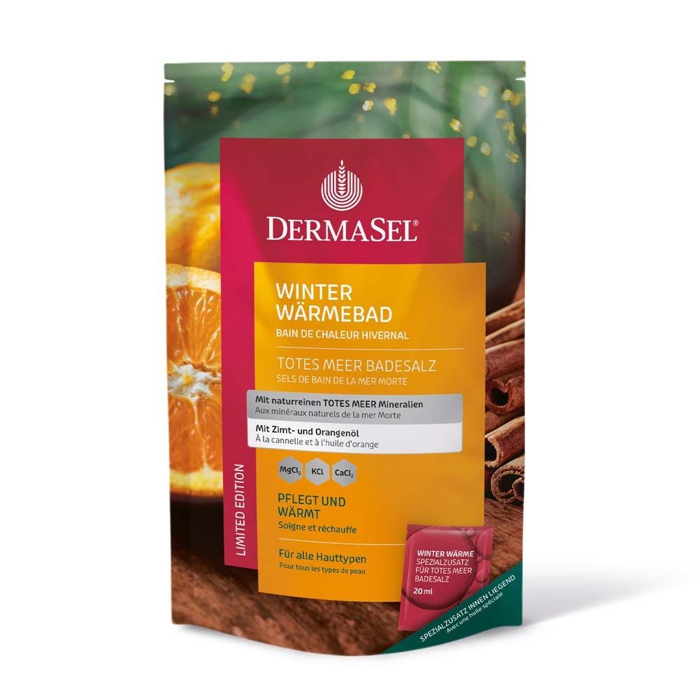 Verpackung von DermaSel Winter Wärmebad. Hauptfarben: Rot, Gelb, Grün. Enthält Badesalz. Mit Zimt- und Orangenöl. Limited Edition.