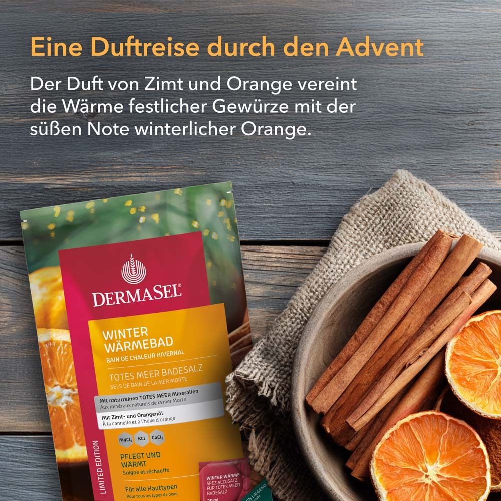 Produktverpackung und Zimtstangen, Orangenscheiben in Holzschale. DermaSel Winter Wärmebad. Text: Zimt und Orange.