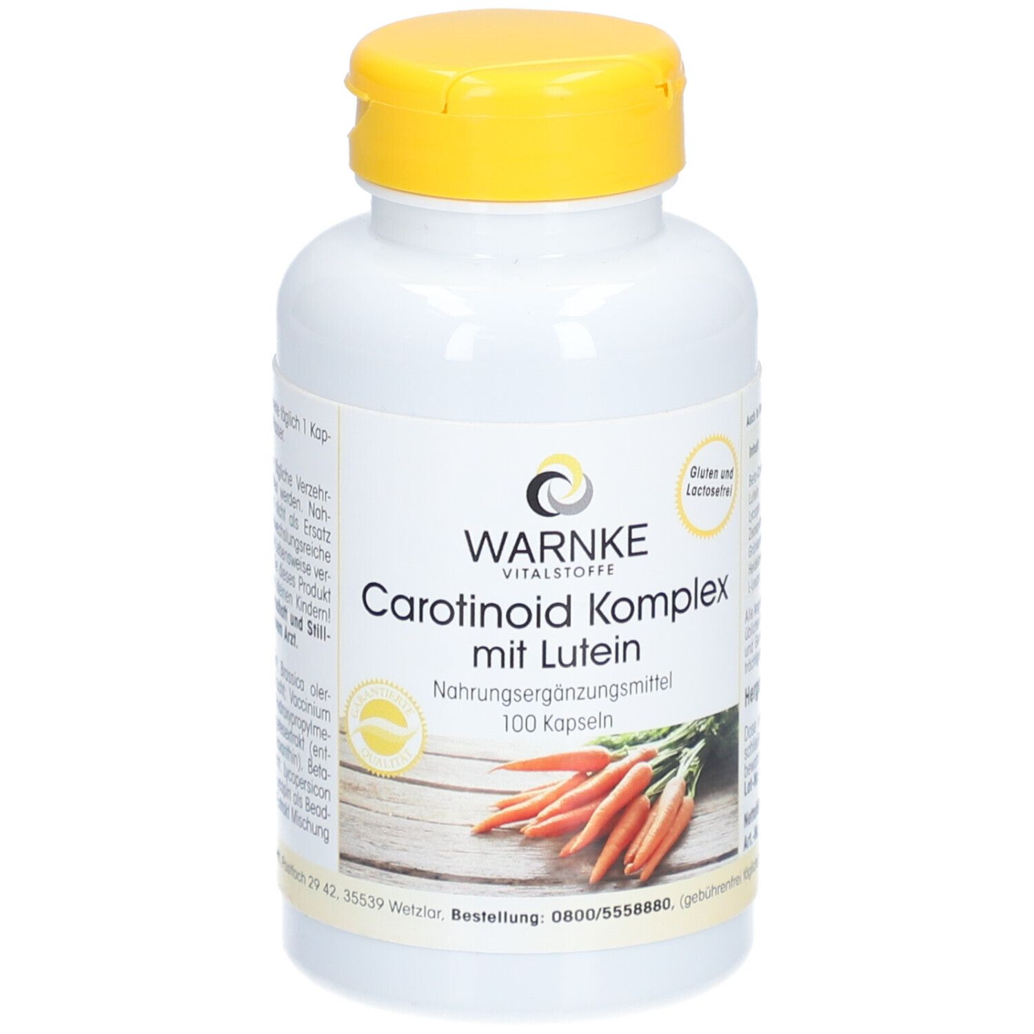 Weiße Flasche mit gelbem Deckel. Aufschrift: WARNKE Vitalstoffe, Carotinoid Komplex mit Lutein, 100 Kapseln. Abbildung von Karotten.