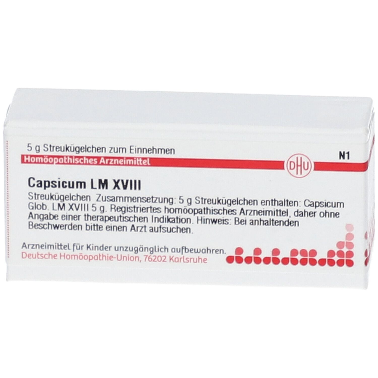 Weiße Schachtel mit roter Schrift und DHU-Logo. Aufschrift: Capsicum LM XVIII, 5 g Streukügelchen. Arzneimittel.