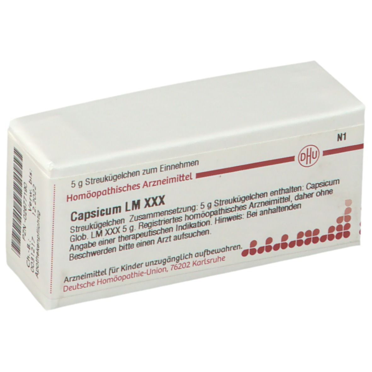 Weiße rechteckige Schachtel mit Produktinformationen. Aufschrift: Capsicum LM XXX, DHU Logo. Enthält Streukügelchen.