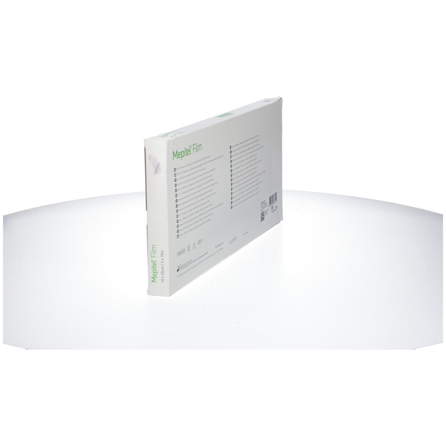 Mepitel Film Verpackung, stehend. Rückseite mit Text. Weiß mit grünen Akzenten.