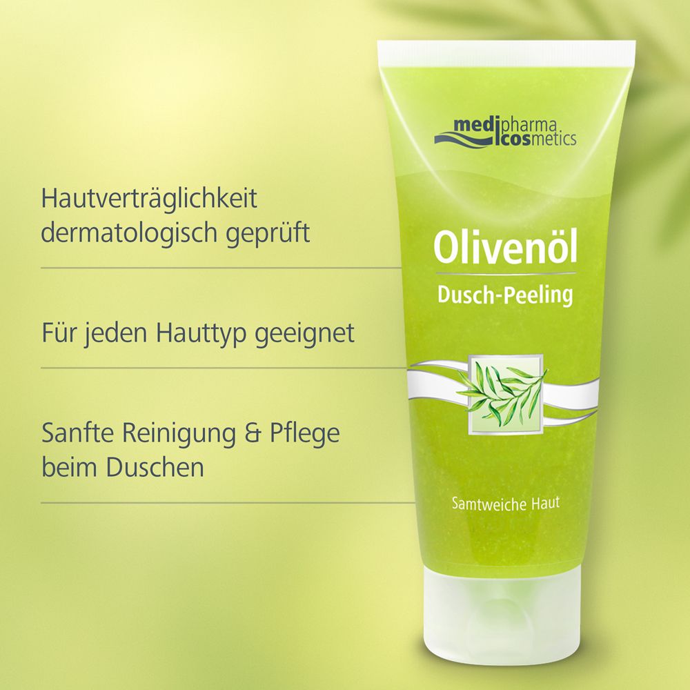 Grüne Tube mit Olivenöl Dusch-Peeling. Produktinformationen und Logo. Text: Hautverträglichkeit dermatologisch geprüft.