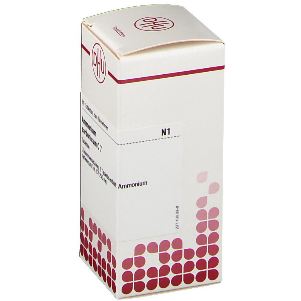 Weiße Schachtel mit DHU-Logo und Aufschrift 'Ammonium carbonicum C 7'. N1-Kennzeichnung. Rote, blütenförmige Muster am unteren Rand.