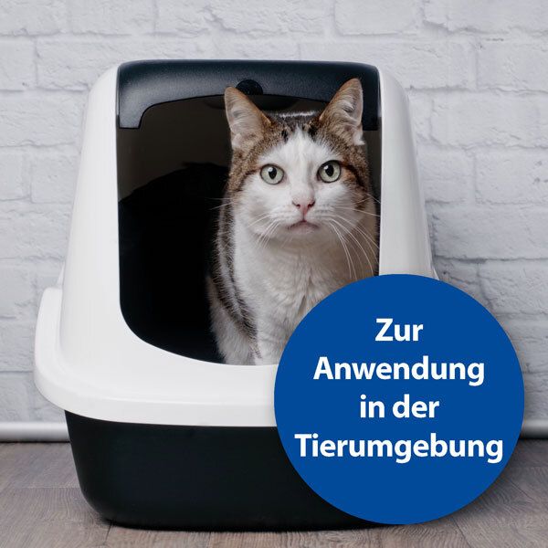 Katze in Katzentoilette. Blauer Kreis mit Text: Zur Anwendung in der Tierumgebung.